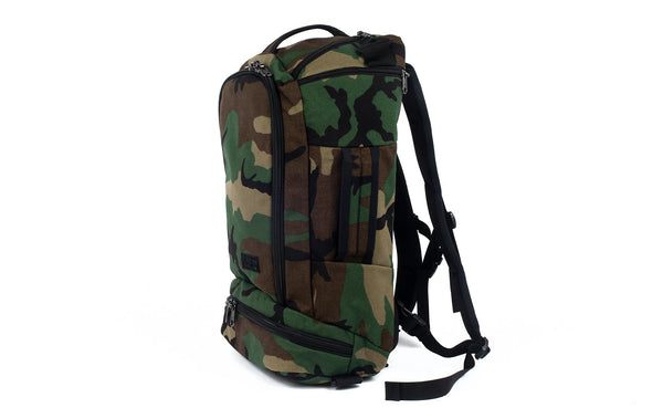 A Techonaut 30 with a Beaver Camo (Camouflage pattern with green, brown, tan, and black) exterior.